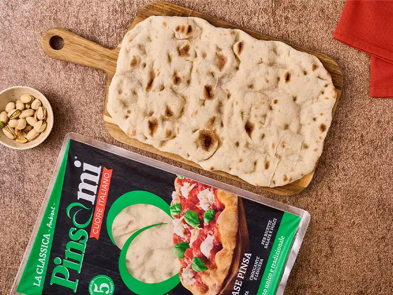 Base pinsa per crema di cachi, cioccolato fondente e pistacchi