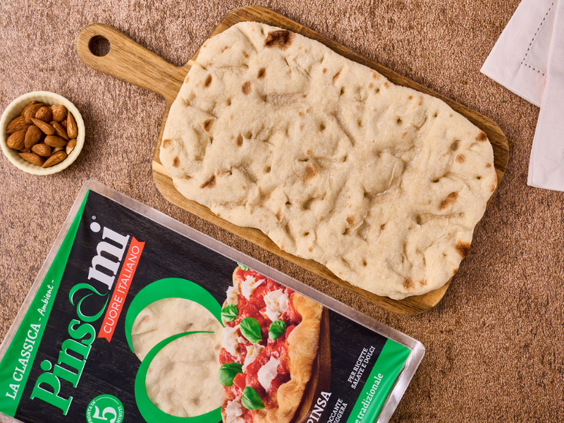 Base pinsa con crema di ricotta, miele e frutta candita