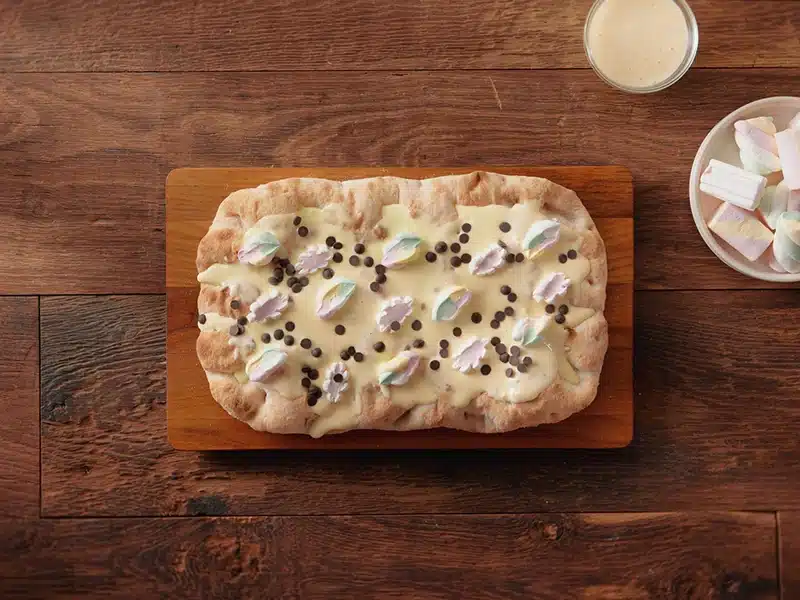 Aggiungi alla pinsa le gocce di cioccolato